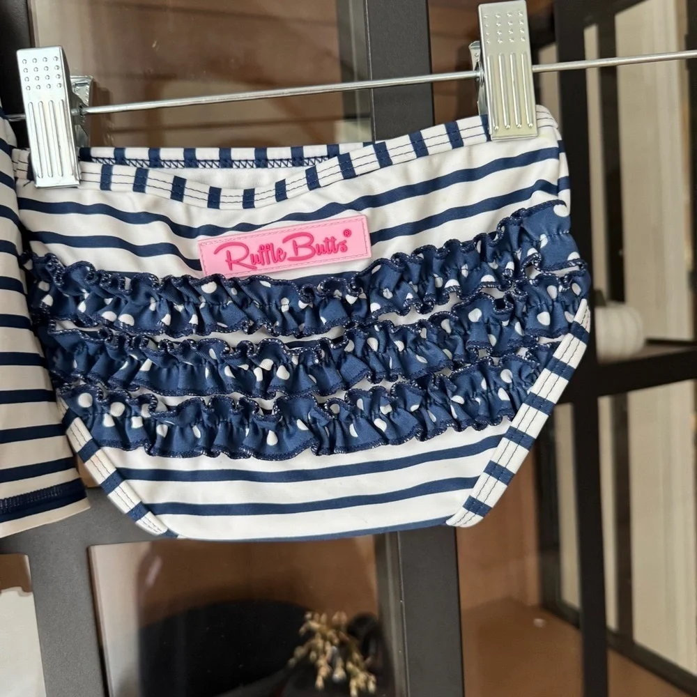 Rufflebutts rashguard swimsuit set ruffles bottoms long sleeve top navy striped